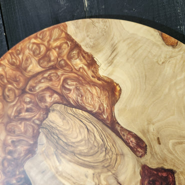 Amber Current – Round Olive Wood & Copper Epoxy Serving Board